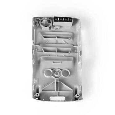Châssis inférieur en plastique gris pour le drone DJI Mavic Mini, avec plusieurs détails et ouvertures.