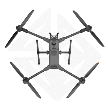 Drone quadricoptère gris en vol stationnaire.