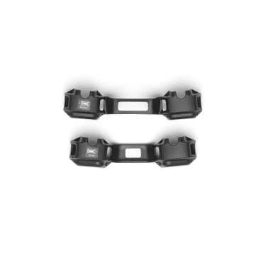 Black plastic holders for electronic devices.