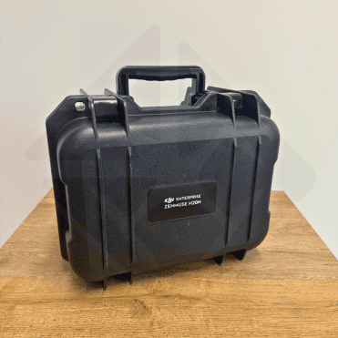 Schwarzes Gehäuse DJI Zenmuse H20N auf dem Tisch.