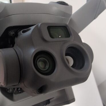 Close-up grey drone camera.