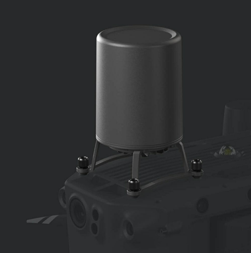 Black radar mounted on a DJI Matrice 300 RTK drone, with a cylindrical design and a stable base.